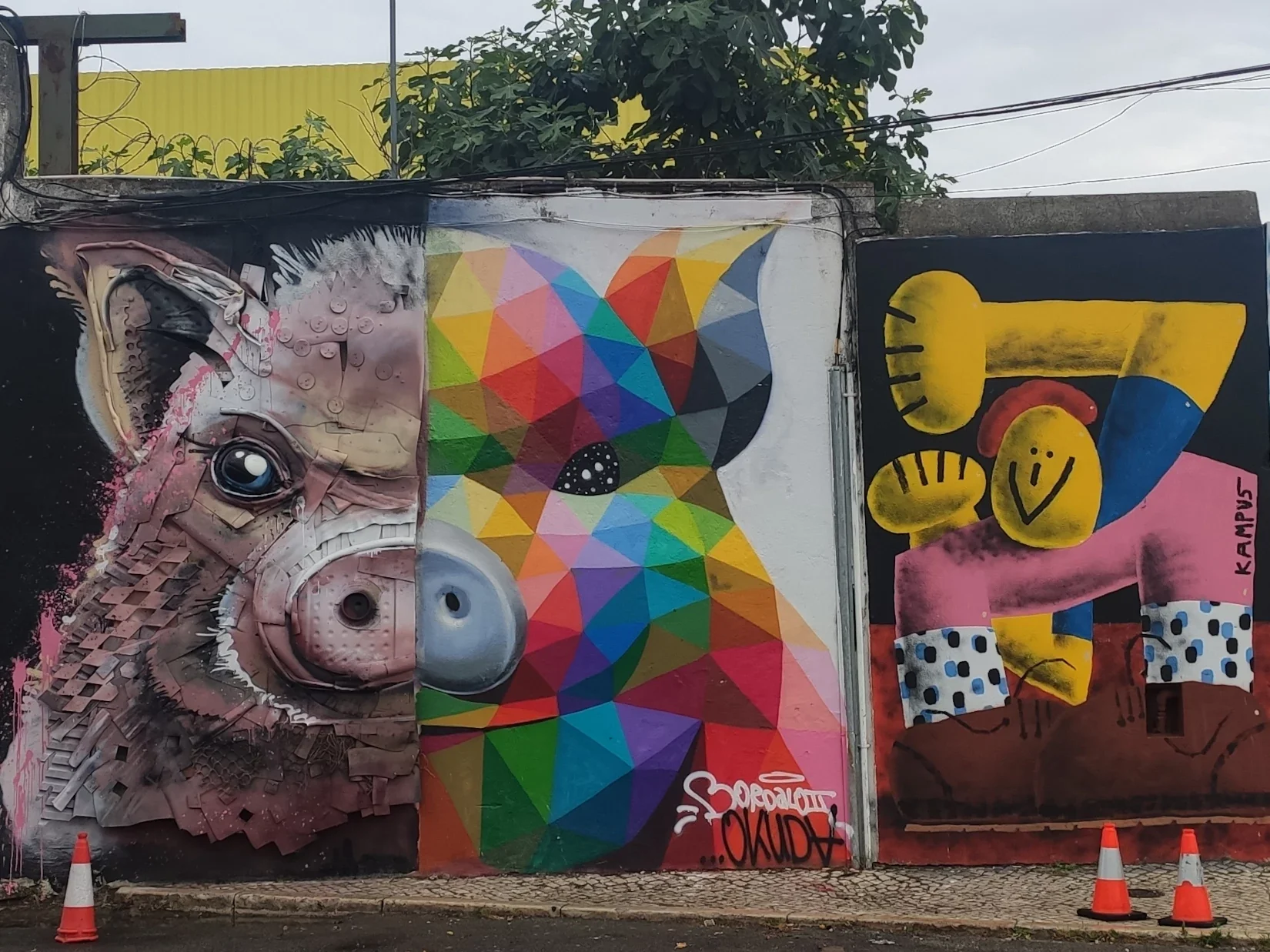 Artwork of Bordalo II and Okuda